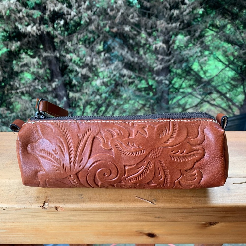 Patricia Nash “Isla” Tooled Leather Oblong Zip
Pouch EUC